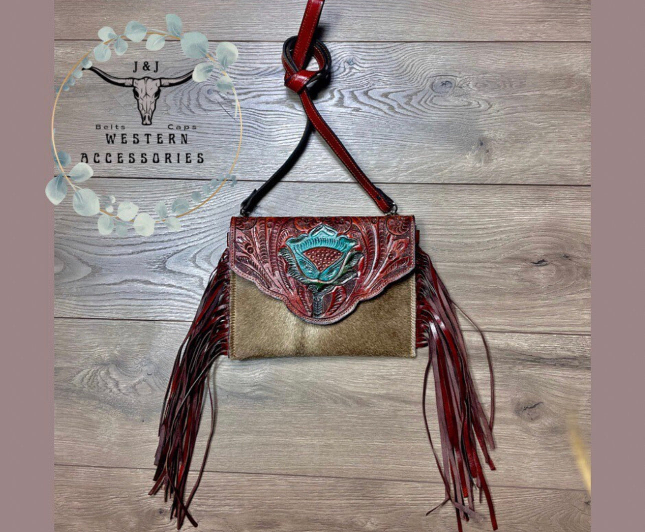 Handmade hand tooled western hair on hide fringe crossbody purse