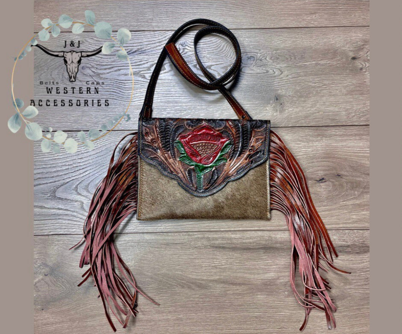 Handmade hand tooled western hair on hide fringe crossbody purse