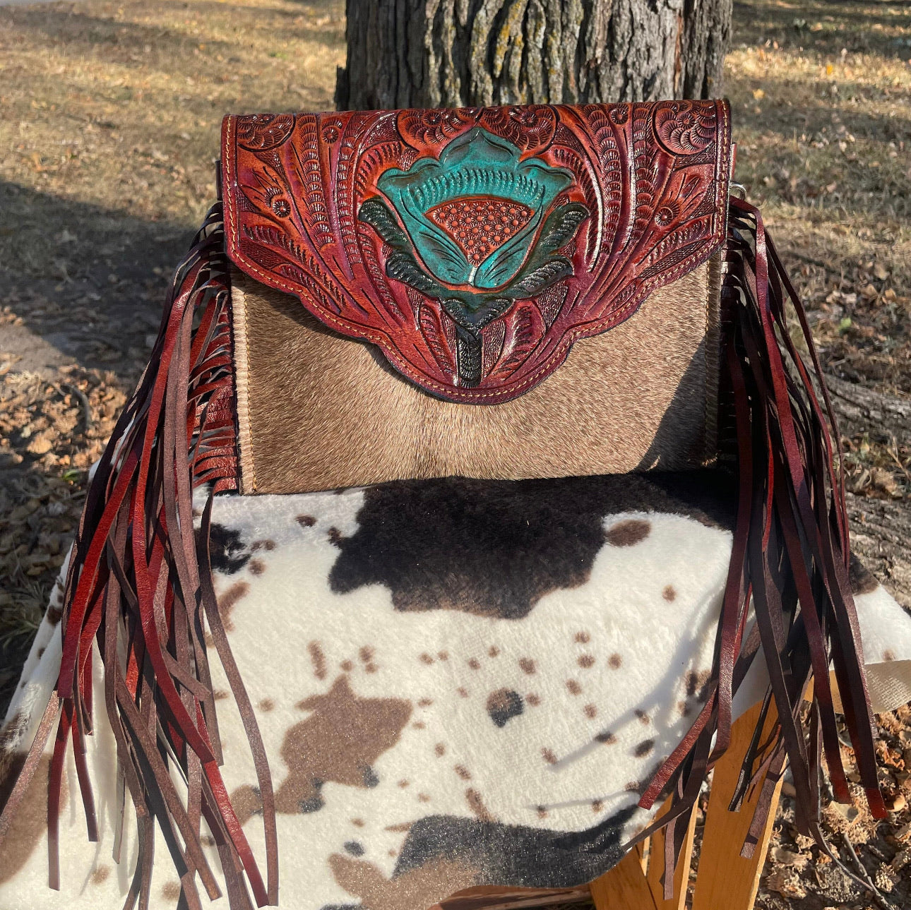 Handmade hand tooled western hair on hide fringe crossbody purse