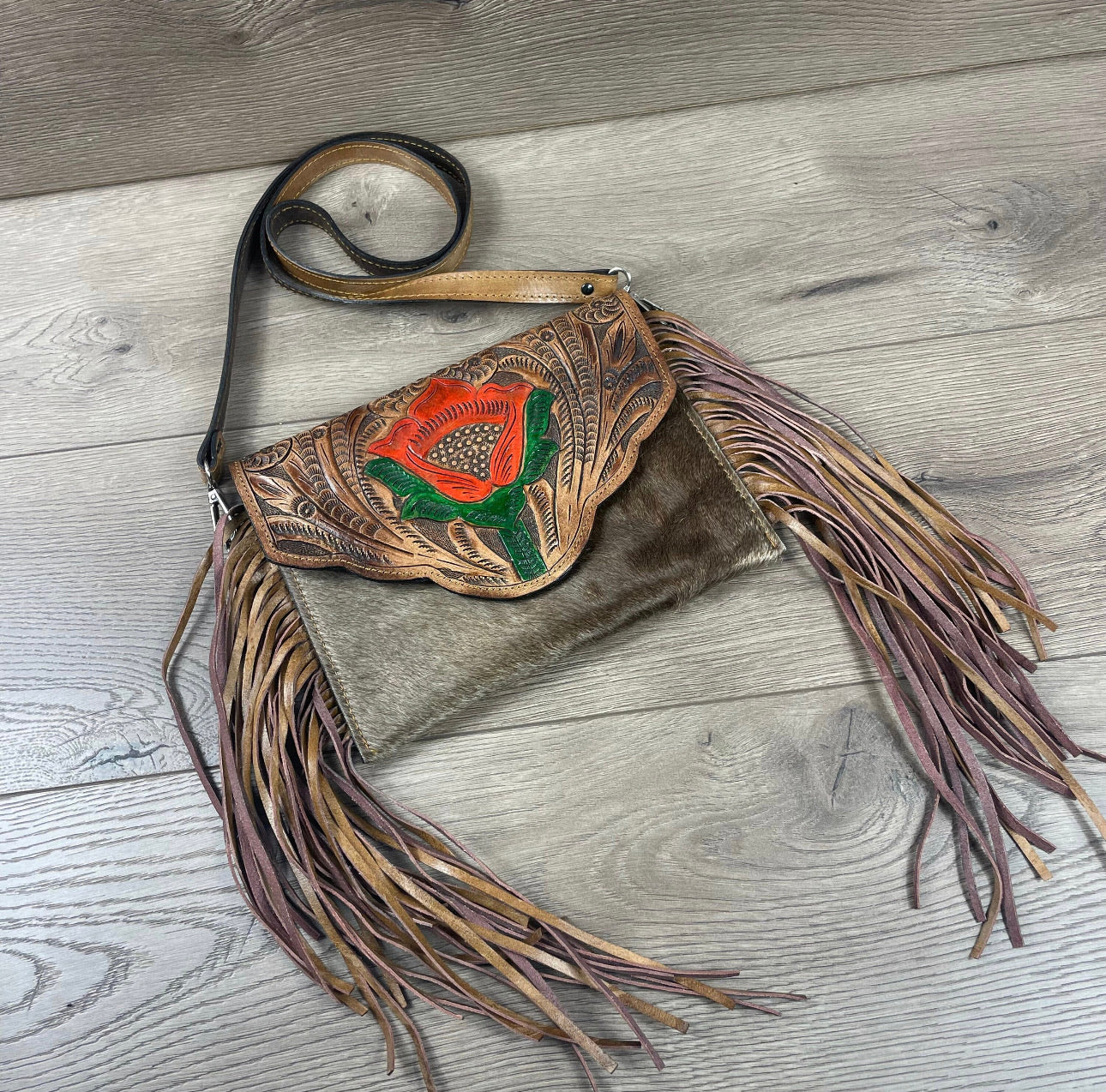 Handmade hand tooled western hair on hide fringe crossbody purse